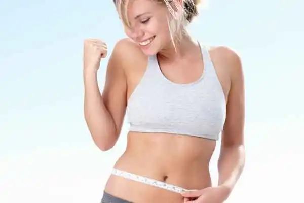woman happy after fat reduction treatment Suffolk