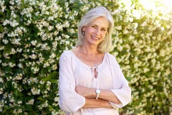 Older woman happy with urinary incontinence treatment Suffolk