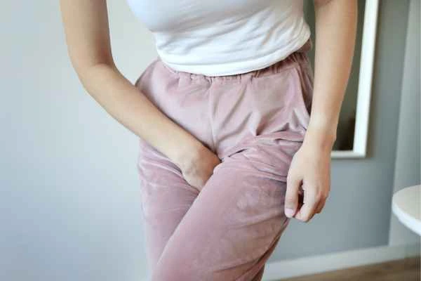 woman struggling with urine incontinence Suffolk